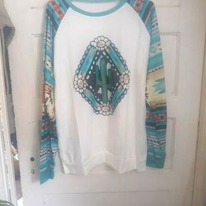 Tops, vest, flannel shirt, tunic, various southwestern tops. Xl